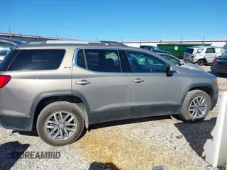2019 GMC Acadia SLE z VIN 1GKKNLLS1KZ262878, wystawiony jako IAAI lot #40863657 z przebiegiem 79 402 mil mil oraz . Historia ofert i sprzedaży dostępna na DreamBid. Obrazek 13.
