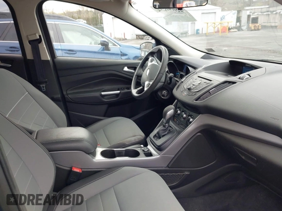 2015 Ford Escape SE with VIN 1FMCU9GX4FUC73125, listed as a IAAI auction lot 42071815 with 71,681 mi miles. Bid and sale history available at carsss.com. Image 5.