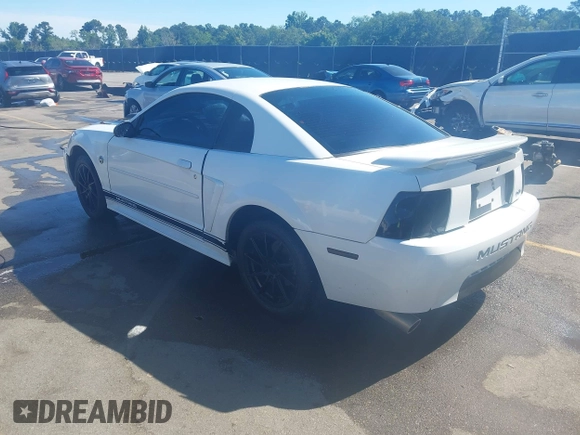 2004 Ford Mustang Standard z VIN 1FAFP40654F229283, wystawiony jako IAAI lot #42309648 z przebiegiem 164 610 mil mil oraz . Historia ofert i sprzedaży dostępna na DreamBid. Obrazek 3.