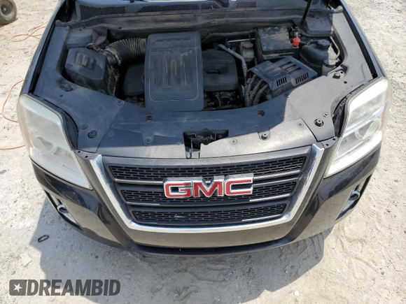 2015 GMC Terrain SLE z VIN 2GKALMEK0F6143709, wystawiony jako Copart lot #57421565 z przebiegiem 128 517 mil mil oraz Czysty tytuł • Clean title. Historia ofert i sprzedaży dostępna na DreamBid. Obrazek 12.