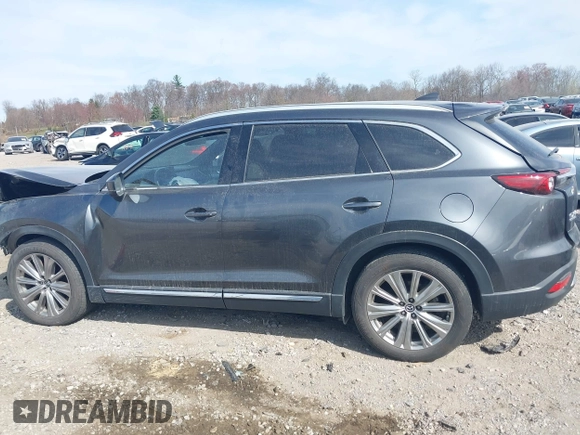 2021 Mazda CX-9 Signature with VIN JM3TCBEY5M0523199, listed as a IAAI auction lot 41916480 with 56,772 mi miles. Bid and sale history available at carsss.com. Image 14.