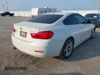 2015 BMW 4 Series 428i z VIN WBA3N7C58FK224500, wystawiony jako IAAI lot #42044727 z przebiegiem 71 815 mil mil oraz . Historia ofert i sprzedaży dostępna na DreamBid. Obrazek 4.