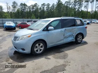 2015 Toyota Sienna LE AAS with VIN 5TDKK3DC5FS667564, listed as a Copart auction lot 58712435 with 106,593 mi miles and Salvage title. Bid and sale history available at DreamBid. Image 1.