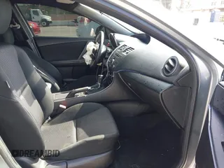 2012 Mazda Mazda3 i Touring with VIN JM1BL1L89C1558242, listed as a IAAI auction lot 42057513 with 112,094 mi miles. Bid and sale history available at carsss.com. Image 5.