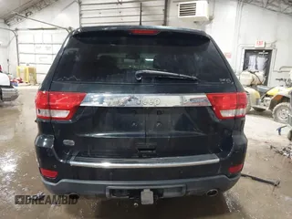 2013 Jeep Grand Cherokee Overland with VIN 1C4RJECT4DC526465, listed as a IAAI auction lot 41570663 with 116,948 mi miles. Bid and sale history available at carsss.com. Image 16.