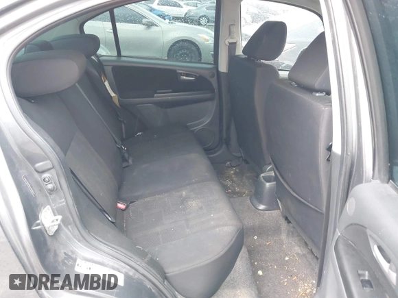 2012 Suzuki SX4 with VIN JS2YC5A55C6300349, listed as a IAAI auction lot 41472004 with 178,487 mi miles and . Bid and sale history available at DreamBid. Image 8.