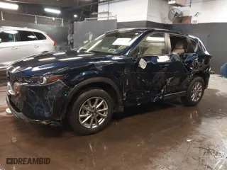 2023 Mazda CX-5 2.5 S Carbon Edition with VIN JM3KFBCM3P0265952, listed as a IAAI auction lot 41541769 with 12,886 mi miles. Bid and sale history available at carsss.com. Image 2.