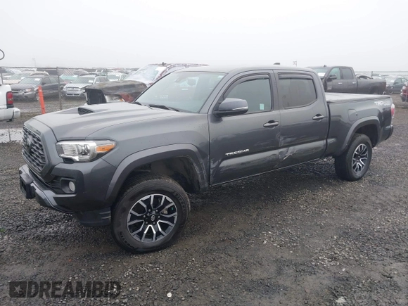 2021 Toyota Tacoma 4WD SR5 with VIN 3TMDZ5BN4MM099423, listed as a IAAI auction lot 41208397 with 62,935 mi miles. Bid and sale history available at carsss.com. Image 2.