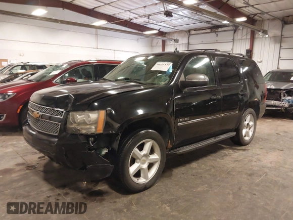 2012 Chevrolet Tahoe LTZ with VIN 1GNSKCE02CR297261, listed as a IAAI auction lot 40255137 with 283,110 mi miles and . Bid and sale history available at DreamBid. Image 2.