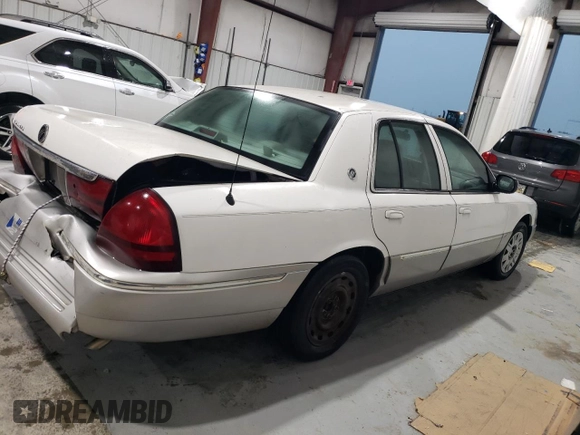 2005 Mercury Grand Marquis GS z VIN 2MEFM74W05X612471, wystawiony jako Copart lot #49455195 z przebiegiem 140 916 mil mil oraz Szkoda całkowita • Salvage title. Historia ofert i sprzedaży dostępna na DreamBid. Obrazek 3.