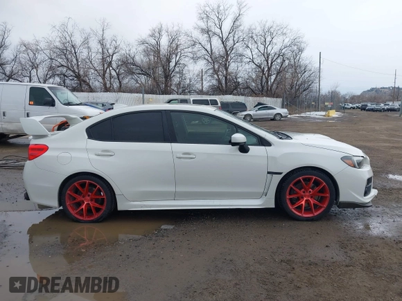 2016 Subaru WRX Premium with VIN JF1VA1E6XG9819308, listed as a IAAI auction lot 41681007 with 153,201 mi miles. Bid and sale history available at carsss.com. Image 14.