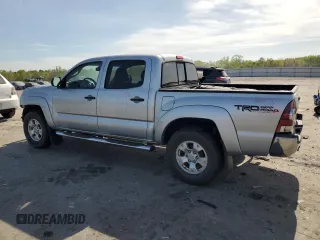 2013 Toyota Tacoma with VIN 5TFLU4EN7DX073036, listed as a Copart auction lot 52871485 with 114,809 mi miles and Salvage Title. Bid and sale history available at DreamBid. Image 2.