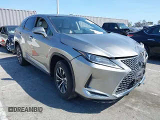 2022 Lexus RX with VIN 2T2AZMAAXNC228573, listed as a IAAI auction lot 41976051 with 22,784 mi miles. Bid and sale history available at carsss.com. Image 1.