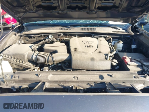 2023 Toyota Tacoma SR with VIN 3TMCZ5AN2PM553928, listed as a IAAI auction lot 40999044 with 9,210 mi miles and . Bid and sale history available at DreamBid. Image 10.