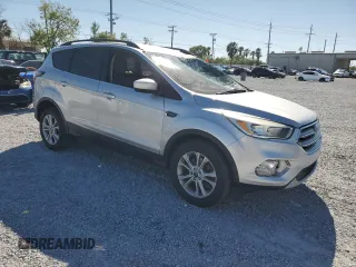 2018 Ford Escape SE with VIN 1FMCU0G98JUB49767, listed as a Copart auction lot 48140885 with 90,906 mi miles and Salvage Title. Bid and sale history available at carsss.com. Image 4.