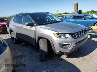 2020 Jeep Compass Trailhawk with VIN 3C4NJDDB6LT195910, listed as a Copart auction lot 55456015 with 122,138 mi miles and Salvage title. Bid and sale history available at DreamBid. Image 4.