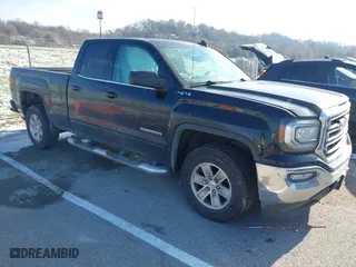 2016 GMC Sierra 1500 SLE with VIN 1GTV2MEC8GZ223290, listed as a IAAI auction lot 41006000 with 81,123 mi miles. Bid and sale history available at carsss.com. Image 1.