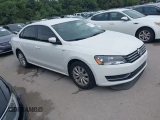 2014 Volkswagen Passat Wolfsburg Edition with VIN 1VWAT7A30EC114323, listed as a IAAI auction lot 42657447 with 132,980 mi miles and . Bid and sale history available at DreamBid. Image 1.
