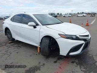 2023 Toyota Camry SE with VIN 4T1G11AK2PU822122, listed as a IAAI auction lot 41880757 with 56,106 mi miles and . Bid and sale history available at DreamBid. Image 1.