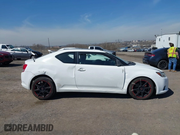 2012 Scion tC with VIN JTKJF5C7XC3029980, listed as a IAAI auction lot 41832490 with 132,140 mi miles. Bid and sale history available at carsss.com. Image 14.