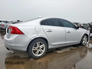 2015 Volvo S60 T5 Drive-E Premier z VIN YV126MFK4F1355600, wystawiony jako Copart lot #54455545 z przebiegiem Nie podano mil oraz Czysty tytuł • Clean title. Historia ofert i sprzedaży dostępna na DreamBid. Obrazek 3.