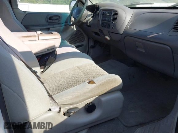 2003 Ford F-150 XL with VIN 1FTRX17W13NB93902, listed as a IAAI auction lot 42670081 with 145,918 mi miles and . Bid and sale history available at DreamBid. Image 5.