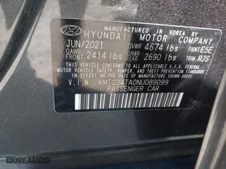 2022 Genesis G70 2.0T with VIN KMTG34TA0NU089099, listed as a IAAI auction lot 41708106 with 35,550 mi miles. Bid and sale history available at carsss.com. Image 9.