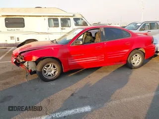 2001 Pontiac Grand Am SE1 with VIN 1G2NF52T91M570800, listed as a IAAI auction lot 41307660 with 180,401 mi miles. Bid and sale history available at carsss.com. Image 13.