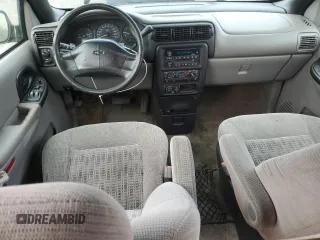 2003 Chevrolet Venture 1SA z VIN 1GNDX03E23D186939, wystawiony jako Copart lot #72334894 z przebiegiem 184 043 mil mil oraz Szkody całkowita. Historia ofert i sprzedaży dostępna na DreamBid. Obrazek 8.