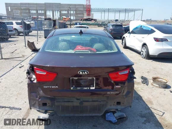 2014 Kia Optima LX with VIN 5XXGM4A70EG273483, listed as a IAAI auction lot 42402765 with 129,770 mi miles and . Bid and sale history available at DreamBid. Image 16.
