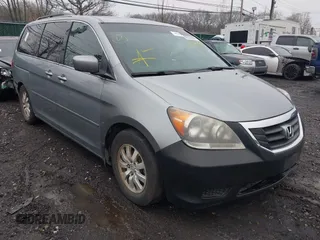 2010 Honda Odyssey EX-L with VIN 5FNRL3H77AB006849, listed as a IAAI auction lot 41959801 with Not Provided miles. Bid and sale history available at carsss.com. Image 1.