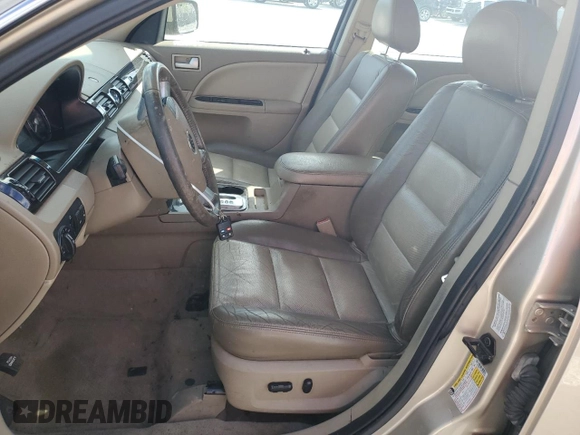 2006 Mercury Montego Premier z VIN 1MEHM42146G607991, wystawiony jako Copart lot #44537745 z przebiegiem 97 499 mil mil oraz Czysty tytuł • Clean title. Historia ofert i sprzedaży dostępna na DreamBid. Obrazek 7.