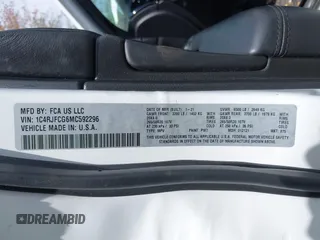 2021 Jeep Grand Cherokee Overland with VIN 1C4RJFCG6MC592296, listed as a IAAI auction lot 42170899 with 56,553 mi miles and . Bid and sale history available at DreamBid. Image 9.
