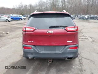 2015 Jeep Cherokee Latitude with VIN 1C4PJMCS6FW594812, listed as a IAAI auction lot 41709068 with 125,232 mi miles. Bid and sale history available at carsss.com. Image 16.