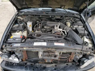 1998 Oldsmobile Bravada z VIN 1GHDT13W9W2730673, wystawiony jako Copart lot #80996524 z przebiegiem 126 418 mil mil oraz Nie do naprawy. Historia ofert i sprzedaży dostępna na DreamBid. Obrazek 12.