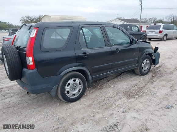 2005 Honda CR-V LX with VIN JHLRD68565C016677, listed as a IAAI auction lot 41570773 with 192,932 mi miles. Bid and sale history available at carsss.com. Image 4.