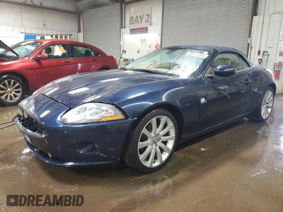 2007 Jaguar XK with VIN SAJDA44BX75B00447, listed as a Copart auction lot 50147695 with 119,467 mi miles and Salvage Title. Bid and sale history available at carsss.com. Image 1.