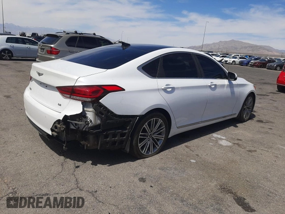 2018 Genesis G80 3.8L z VIN KMHGN4JE6JU225868, wystawiony jako Copart lot #52795435 z przebiegiem 130 974 mil mil oraz Szkody całkowita. Historia ofert i sprzedaży dostępna na DreamBid. Obrazek 3.