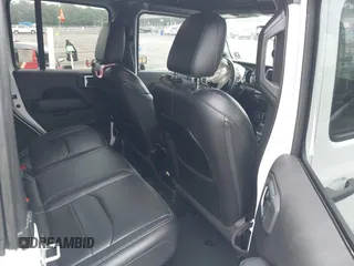 2022 Jeep Wrangler Unlimited Sahara with VIN 1C4JJXP69NW229124, listed as a IAAI auction lot 42525560 with 45,857 mi miles and . Bid and sale history available at DreamBid. Image 8.