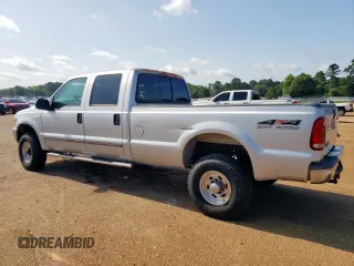 1999 Ford F-350 XL with VIN 1FTSW31S2XEE89071, listed as a Copart auction lot 61016685 with 115,130 mi miles and Salvage title. Bid and sale history available at DreamBid. Image 2.