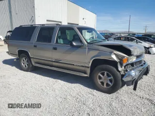 1999 Chevrolet Suburban with VIN 1GNFK16R6XJ492206, listed as a Copart auction lot 71728594 with 129,871 mi miles and Salvage Title. Bid and sale history available at carsss.com. Image 4.