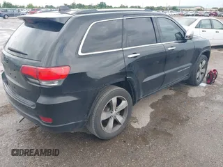 2015 Jeep Grand Cherokee Overland with VIN 1C4RJECG1FC769950, listed as a IAAI auction lot 42405712 with 217,514 mi miles and . Bid and sale history available at DreamBid. Image 4.