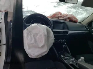 2016 Mazda CX-5 Touring z VIN JM3KE4CY1G0703496, wystawiony jako Copart lot #43806525 z przebiegiem Nie podano mil oraz Szkoda całkowita • Salvage title. Historia ofert i sprzedaży dostępna na DreamBid. Obrazek 8.