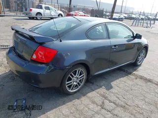 2007 Scion tC Spec with VIN JTKDE167X70184220, listed as a IAAI auction lot 42475206 with 164,426 mi miles and . Bid and sale history available at DreamBid. Image 4.
