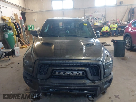 2018 Ram 1500 Rebel with VIN 1C6RR7YT1JS234777, listed as a IAAI auction lot 41409525 with 119,497 mi miles. Bid and sale history available at carsss.com. Image 12.