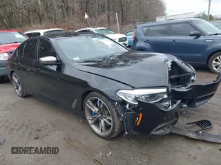 2020 BMW 5 Series M550i xDrive with VIN WBAJS7C09LCD45078, listed as a IAAI auction lot 41850274 with 75,613 mi miles and . Bid and sale history available at DreamBid. Image 1.