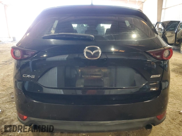 2017 Mazda CX-5 Sport with VIN JM3KFABL9H0210264, listed as a Copart auction lot 87918795 with 129,827 mi miles and Salvage Title. Bid and sale history available at carsss.com. Image 6.