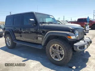 2020 Jeep Wrangler Unlimited Sahara with VIN 1C4HJXEN9LW247869, listed as a Copart auction lot 62697245 with 100,982 mi miles and Salvage title. Bid and sale history available at DreamBid. Image 4.