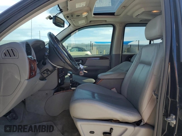 2007 GMC Envoy SLE with VIN 1GKDS13S472107120, listed as a Copart auction lot 42393475 with 106,499 mi miles and Salvage Title. Bid and sale history available at carsss.com. Image 7.