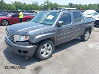 2013 Honda Ridgeline RTL with VIN 5FPYK1F5XDB012354, listed as a IAAI auction lot 42392921 with 248,223 mi miles and . Bid and sale history available at DreamBid. Image 17.